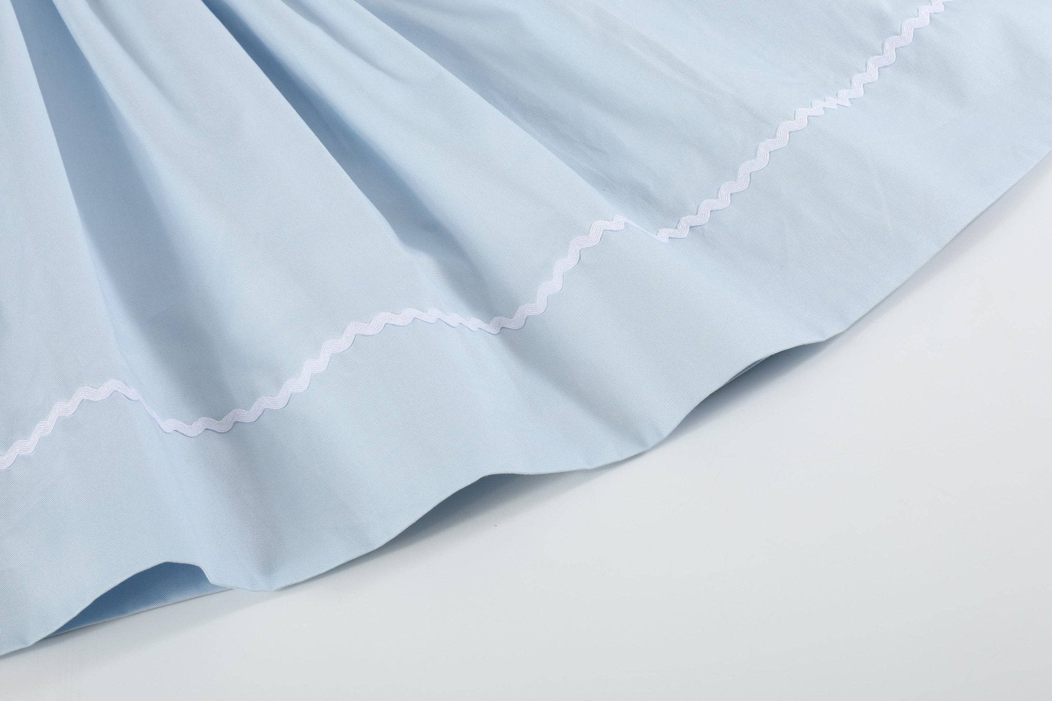 Blue Floral Crosses Smocked Bishop Dress - Liz and Roo