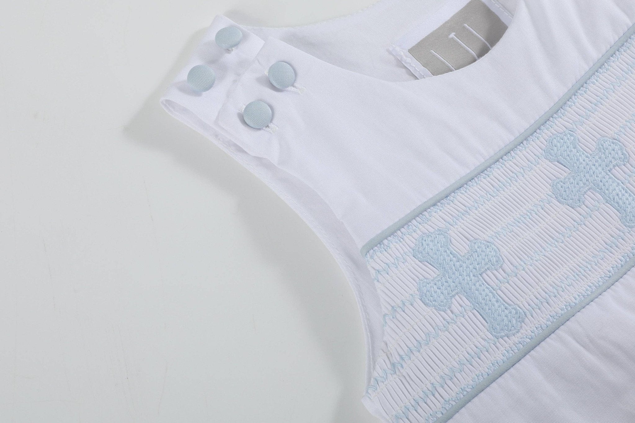 White and Blue Holy Crosses Smocked Overalls - Liz and Roo