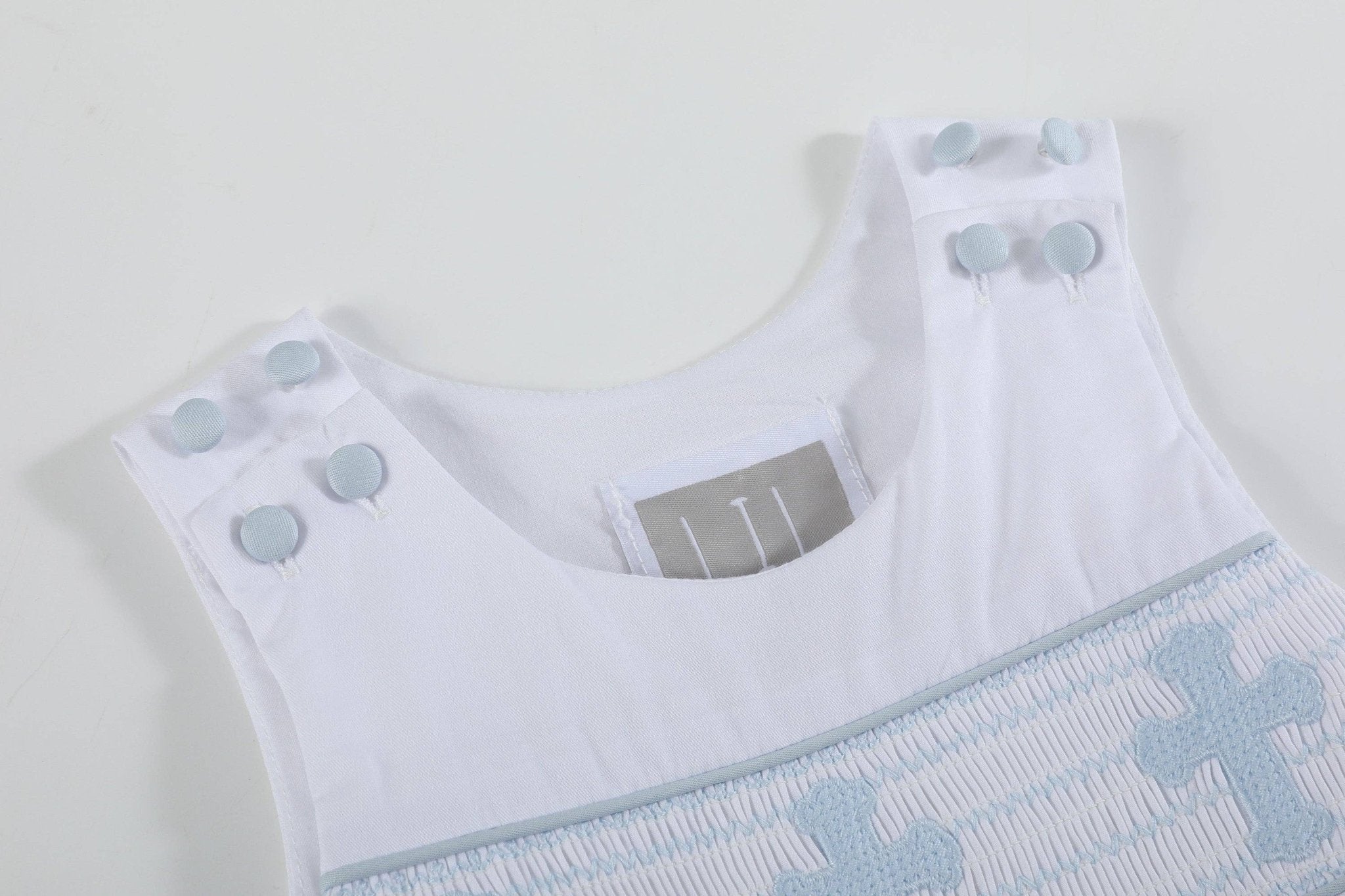 White and Blue Holy Crosses Smocked Overalls - Liz and Roo